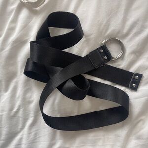Long black belt with silver buckle